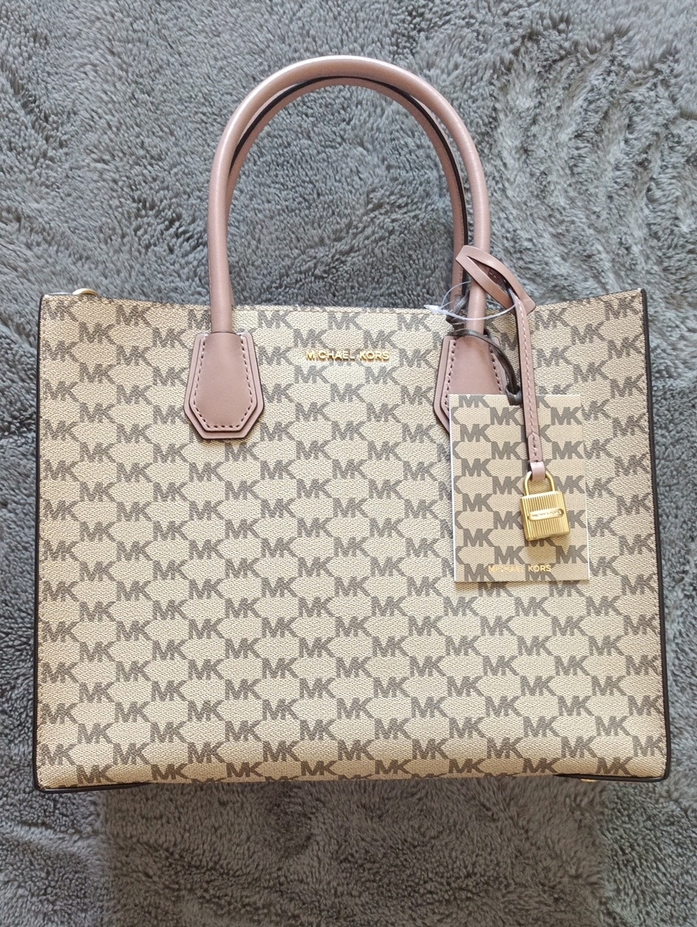 Michael Kors Beige MK Signature Tote with Blush Pink Handles and Gold Hardware